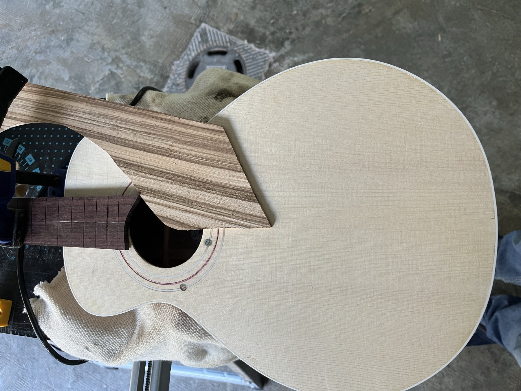 Acoustic guitar with zebrawood headplate, workshop