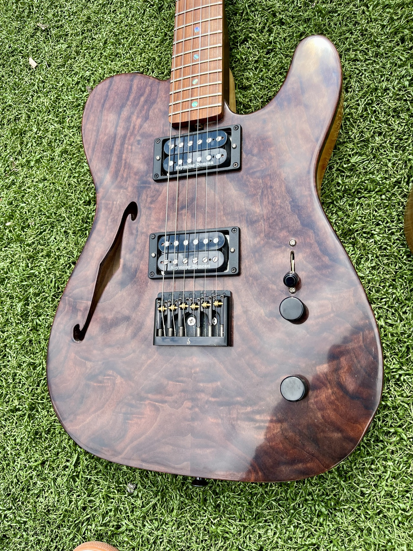 Quilted walnut Telecaster body showing stunning wood figure